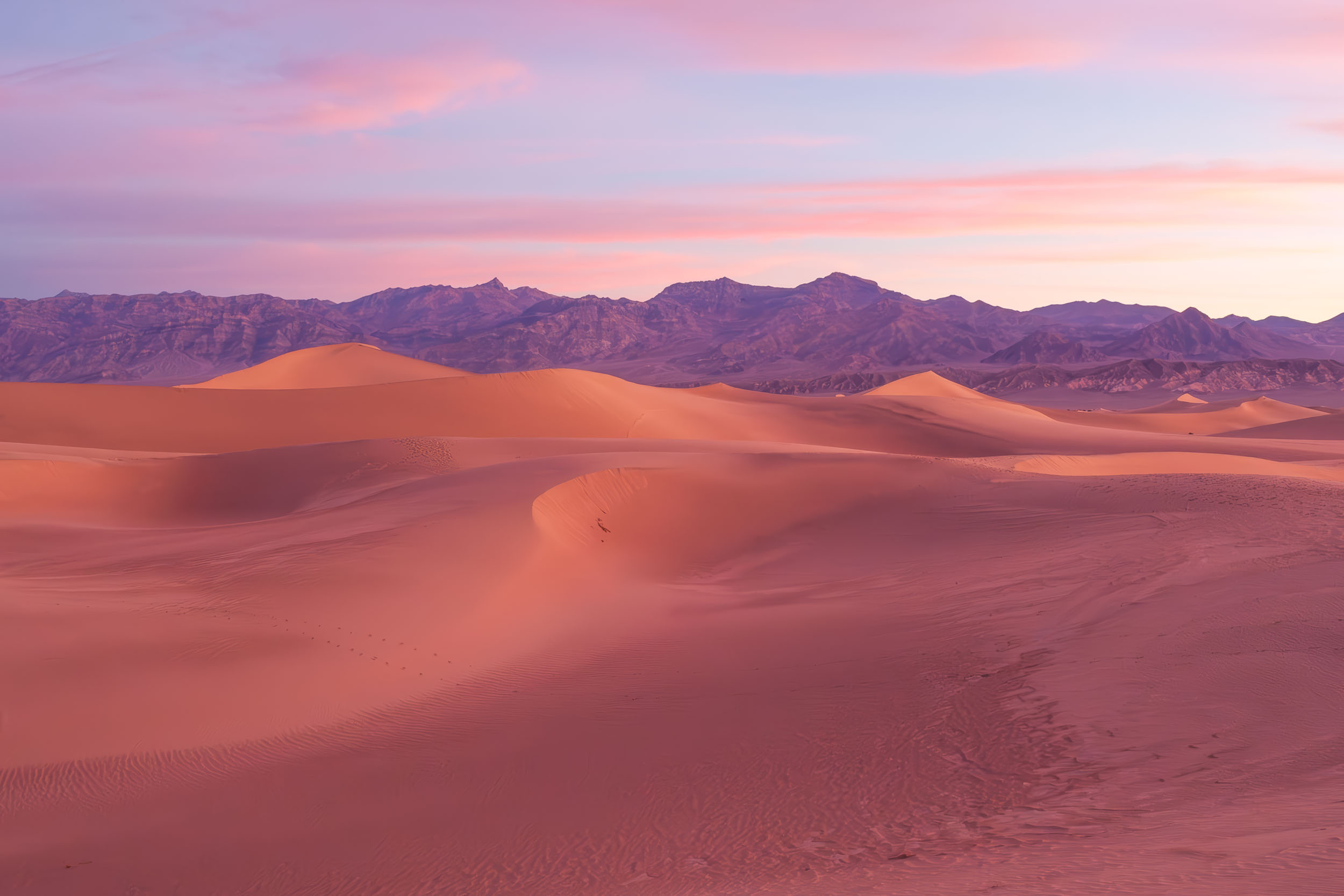 This Mesquite Sand Dunes sunrise in Death Valley reminds me of sherbert ice cream, specifically rainbow sherbert, with it's orange, purple & pink glow.